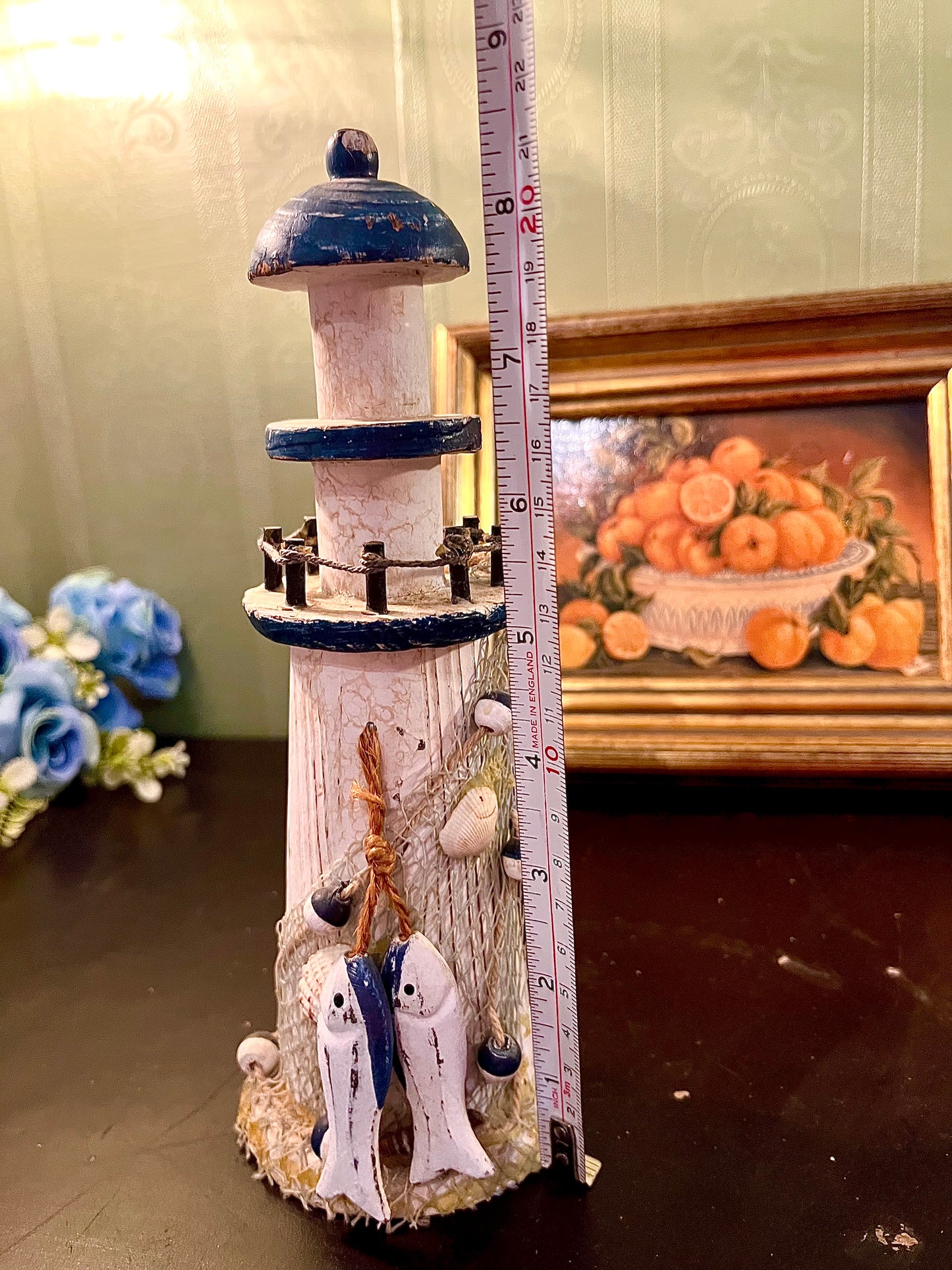 Nautical Lighthouse Ornament with Fishing Net – Coastal Home Decor