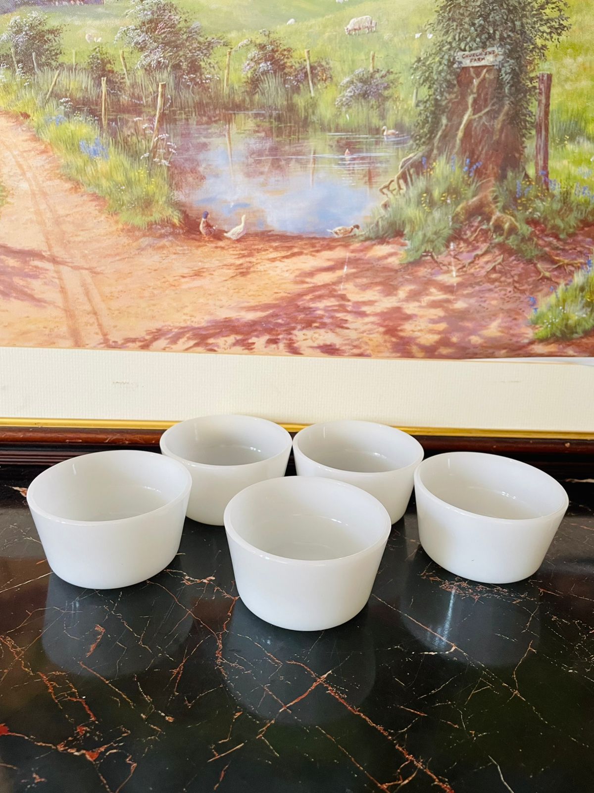 are thrift finds, vintage white milk glass bowls, custard bowls vintage, dessert serving bowls, minimalist kitchen decor, European vintage crockery, collectible white glass bowls, curated vintage collection, heritage European treasures, timeless vintage decor, baking ramekins glass