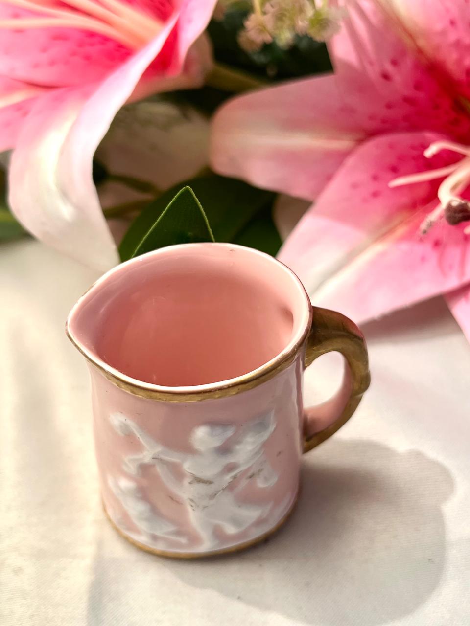 Vintage Japanese Pink Porcelain Mug with Raised Cherub Design & Gold Trim Approx. 8 cm