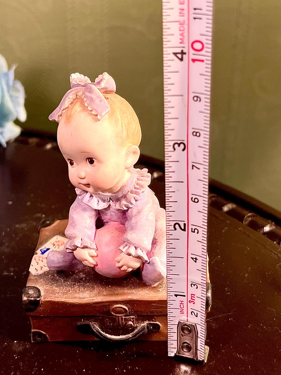 Baby on Suitcase Figurine Lavender Outfit 4 Inch