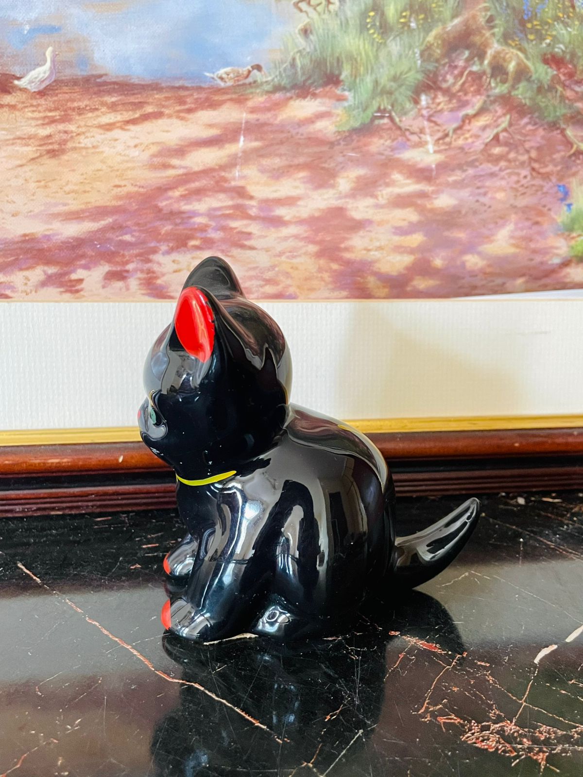 vintage cat figurine, ceramic black cat décor, retro Japan style ceramic, collectible animal figurine, rare thrift finds Pakistan, vintage home décor accessories, cat lover gift Pakistan, heritage ceramic décor, vintage pottery animal figurine, timeless vintage collection