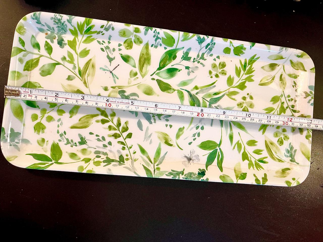 Green leaf tray shown with measuring tape indicating approx. 12 inch length