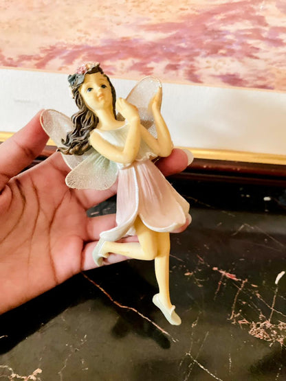 rare thrift finds, vintage fairy figurine, hand painted fairy collectible, fantasy décor Pakistan, resin fairy ornament, English vintage figurine, European vintage drop, curated vintage collection, whimsical fairy décor, timeless vintage collectible