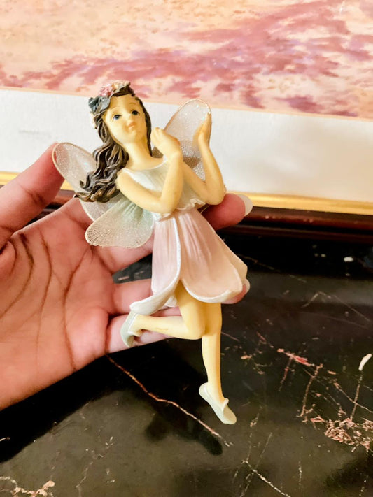 rare thrift finds, vintage fairy figurine, hand painted fairy collectible, fantasy décor Pakistan, resin fairy ornament, English vintage figurine, European vintage drop, curated vintage collection, whimsical fairy décor, timeless vintage collectible
