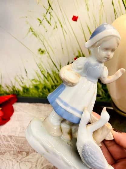 Vintage Blue & White Girl with Goose Figurine