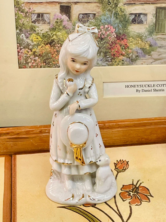 ceramic girl figurine, gold accent decor, puppy collectible, elegant home decor, white porcelain style figurine, glossy resin statue, classy shelf decor, cottagecore girl ornament, dog lover gift, delicate decorative figurine