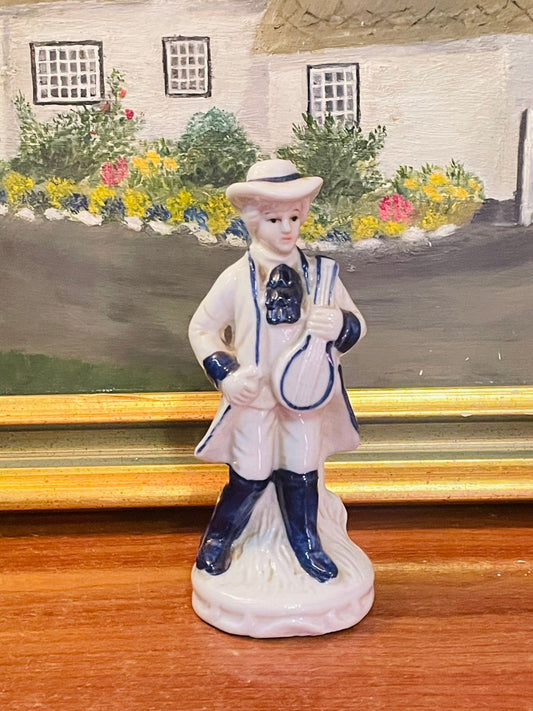 Vintage Porcelain boy Figurine Playing Musical Instrument – Blue Collectible Decor Piece