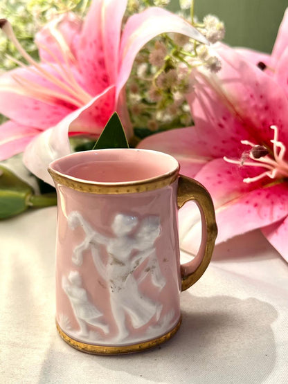 Vintage Japanese Pink Porcelain Mug with Raised Cherub Design & Gold Trim Approx. 8 cm