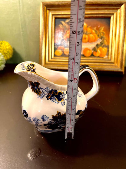 Vintage Blue Floral Porcelain Pitcher with Gold Trim – 5 Inch