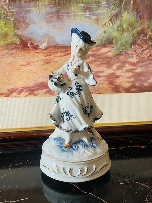 vintage porcelain figurine, musical lady statue, england ceramic decor, blue white porcelain collectible, antique music box figurine, european thrift decor, rare vintage home finds, sunset kitchen thrift shop, hand painted porcelain lady, collectible ceramic england, victorian home decor, old english pottery