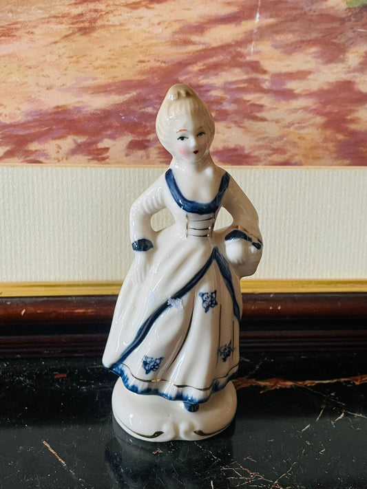 victorian lady figurine, hand painted porcelain japan, vintage collectible decor, japanese porcelain lady, antique home accents, pastel porcelain figurine, european vintage inspired, rare thrift finds, sunset kitchen vintage collection, elegant porcelain statue