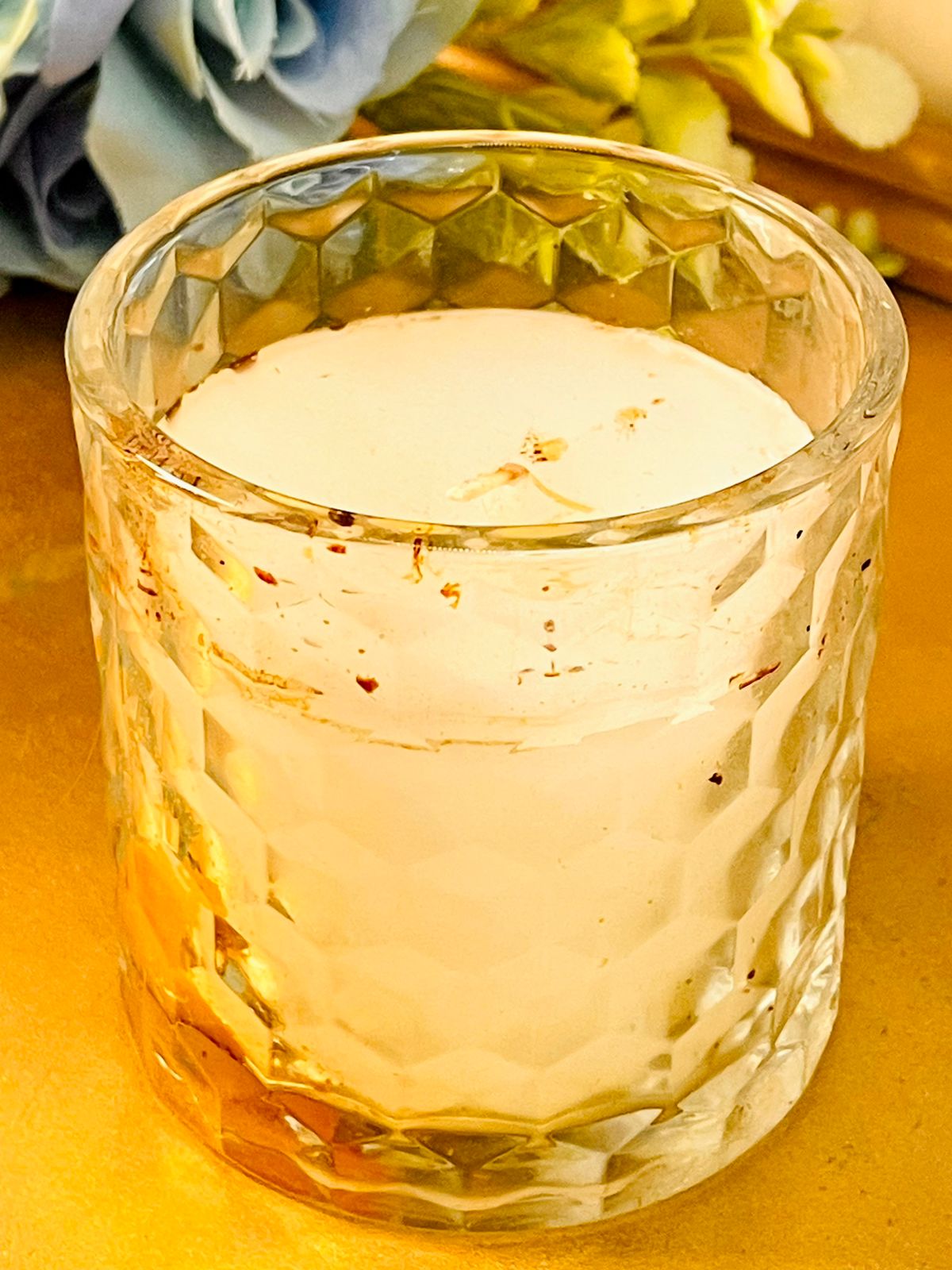 Faceted Glass Candle Holder with White Wax Decor