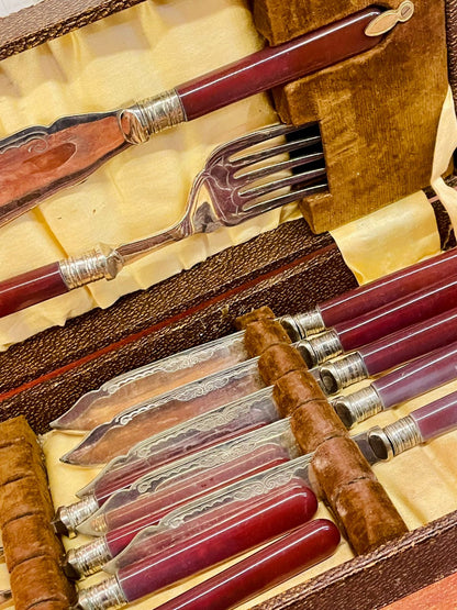 Vintage Maroon-Handled Cutlery Set in Original Case