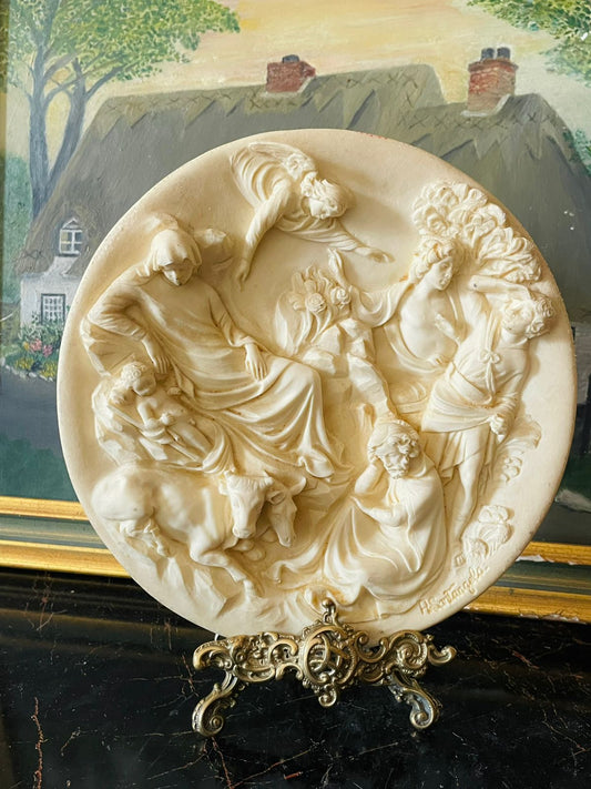 holy family plaque, religious wall art, angels relief sculpture, bas-relief wall decor, renaissance art plate, England wall sculpture, vintage religious decor, nativity wall hanging, classical art relief, ivory sculpture plaque, catholic home decor, collectible wall plate, European art decor, holy family with angels, spiritual home decor
