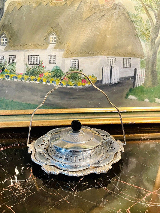 #VintageSilverDish #SilverPlatedServingBowl #AntiqueCoveredDish #EnglishSilverware #DecorativeMetalBowlWithLid #VintageSugarBowlPakistan #OldSilverTableware #CollectibleSilverPlatedDish #VintageHomeDécorPakistan #ServingBowlWithHandle #RetroSilverDishBuyOnline