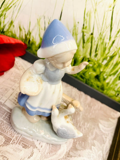 Vintage Blue & White Girl with Goose Figurine