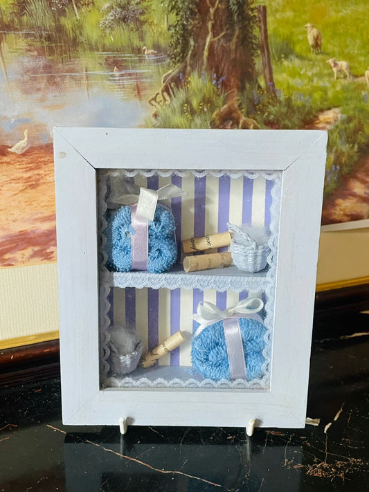 mini wall frame decor, miniature towel shadow box, blue ribbon frame, vintage home decor, thrift home finds, european vintage wall art, rare thrift collection pakistan, cottagecore wall decor, handmade mini frame, england wall decor, shadow box vintage england, sunset kitchen vintage shop, collectible miniature wall art, small decor frame pakistan