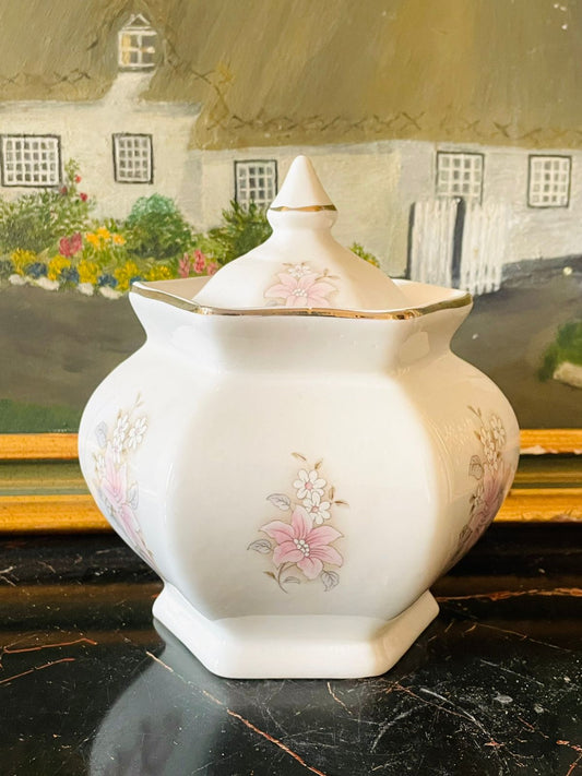 vintage sugar pot, floral porcelain jar, pink lily design, english china jar, gold rim ceramic pot, collectible english pottery, cottagecore kitchen decor, trinket jar with lid, vintage tea set accessory, sunset kitchen vintage