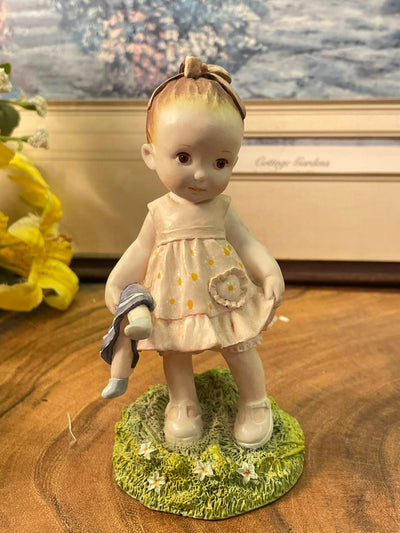 Paw Prints Emily Girl Figurine with Doll