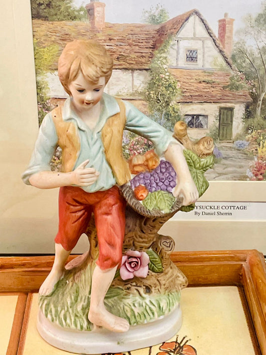 vintage figurine, cottagecore decor, farmhouse home decor, ceramic boy statue, hand painted figurine, rustic shelf decor, collectible figurine, countryside ornament, vintage home accents, cottage decoration