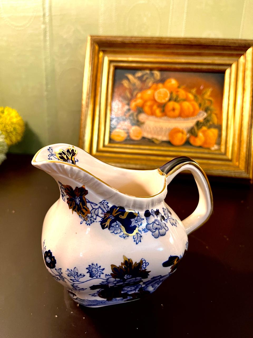 Vintage Blue Floral Porcelain Pitcher with Gold Trim – 5 Inch