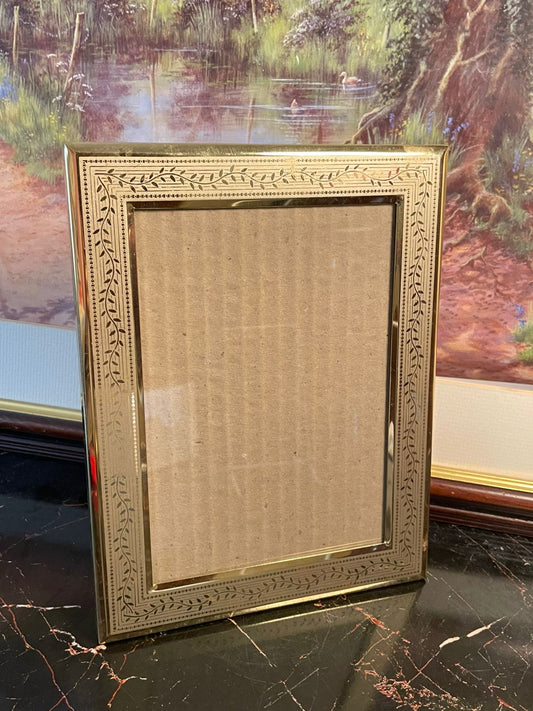 vintage brass photo frame, antique picture frame, velvet back brass frame, vintage décor accessories, rare thrift finds, heritage european treasures, london thrift antiques, brass collectible frame, curated vintage collection, timeless vintage décor pakistan, antique english brass frame