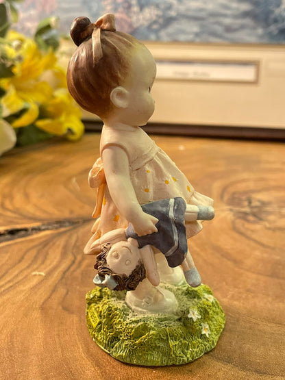 Paw Prints Emily Girl Figurine with Doll