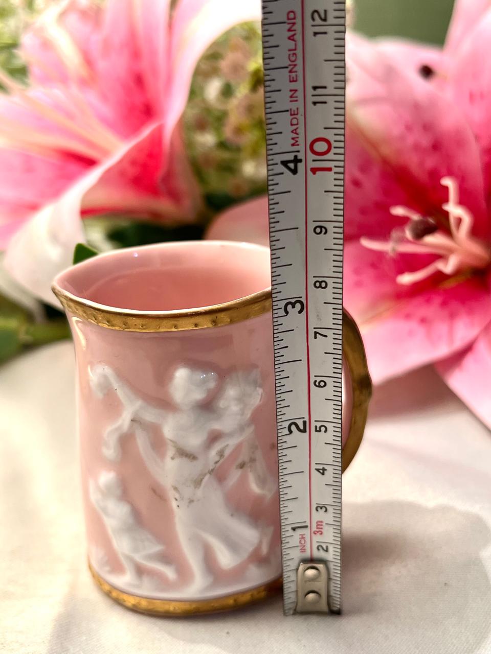Vintage Japanese Pink Porcelain Mug with Raised Cherub Design & Gold Trim Approx. 8 cm