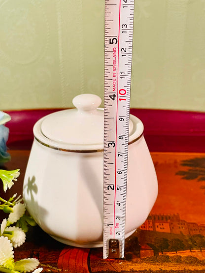 White Ceramic Lidded Jar with Gold Trim – 4 Inch