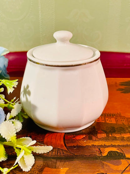 White Ceramic Lidded Jar with Gold Trim – 4 Inch