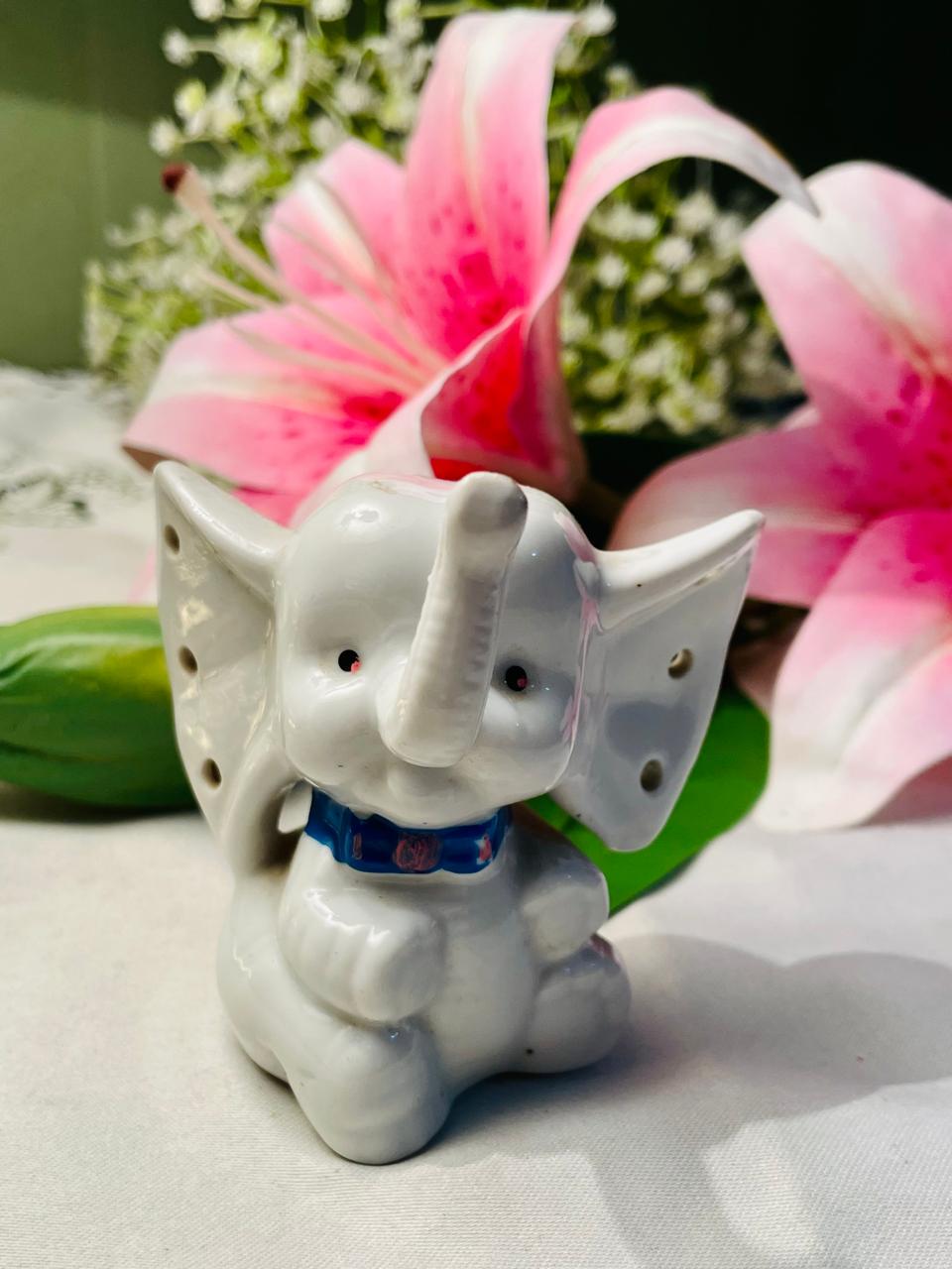 Vintage White Ceramic Elephant Figurine with Pierced Ears 8 cm