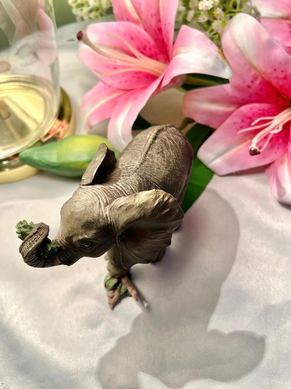 Elephant Figurine with Raised Trunk & Floral Detail – 12 cm