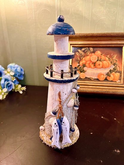 Nautical Lighthouse Ornament with Fishing Net – Coastal Home Decor