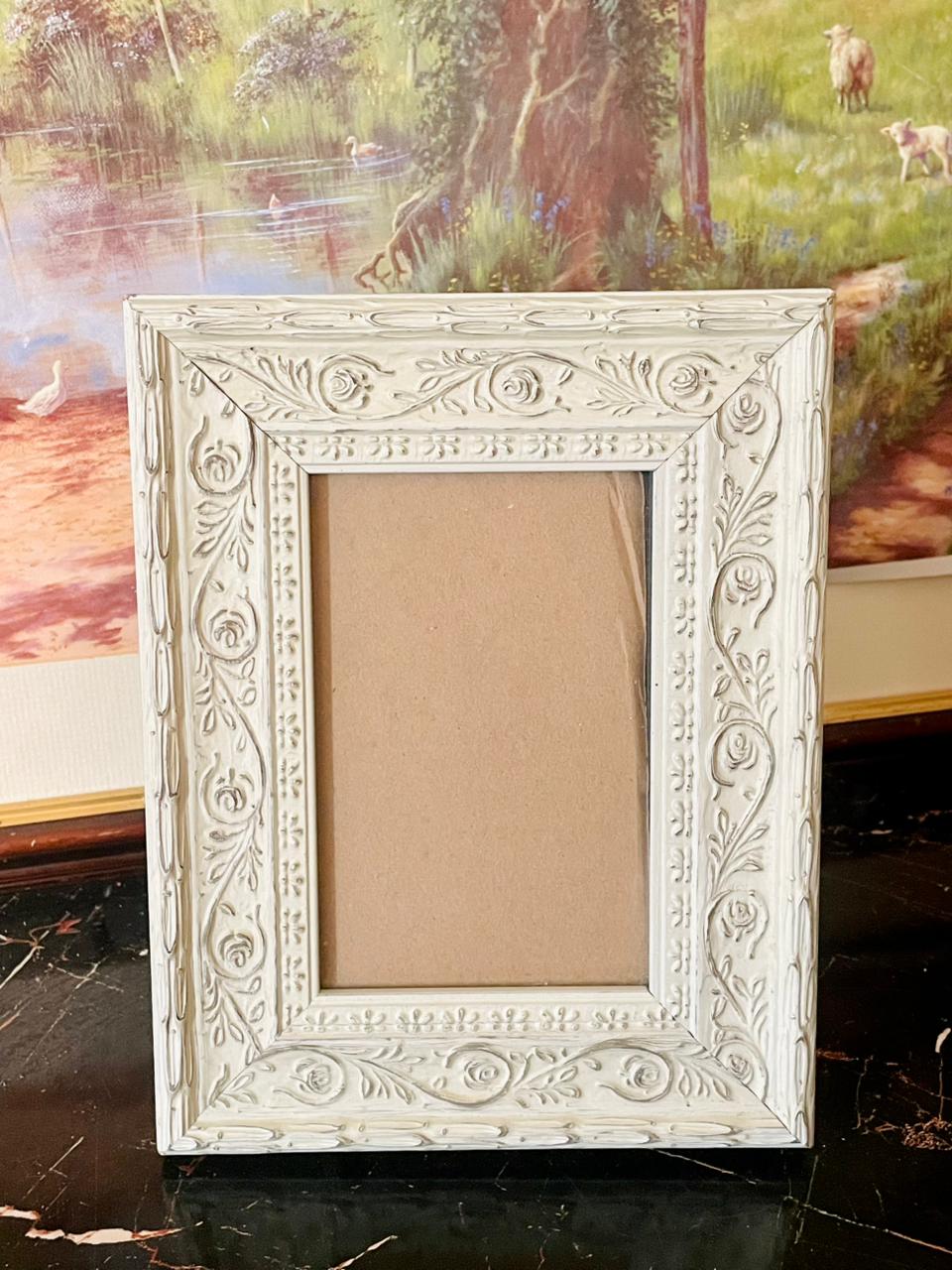 vintage photo frame, floral embossed picture frame, antique white frame Pakistan, shabby chic home décor, rare thrift finds, European vintage drop, collectible photo frames, heritage European treasures, rustic wall & table décor, elegant portrait frame
