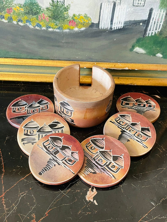 Handcrafted African Ceramic Coaster Set with Holder – Tribal Village Design (Set of 6)