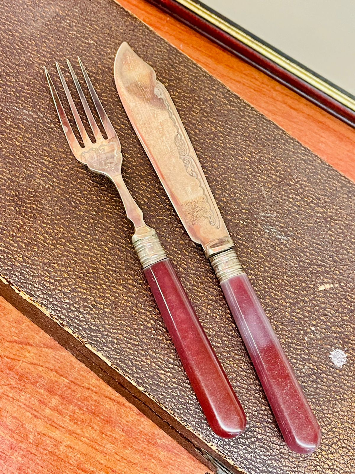Vintage Maroon-Handled Cutlery Set in Original Case
