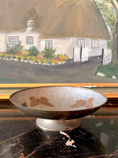 vintage metal bowl, etched butterfly bowl, brass pedestal bowl, english vintage decor, floral metal art bowl, collectible european decor, rare thrift finds pakistan, antique metalware, home styling bowl, sunset kitchen vintage