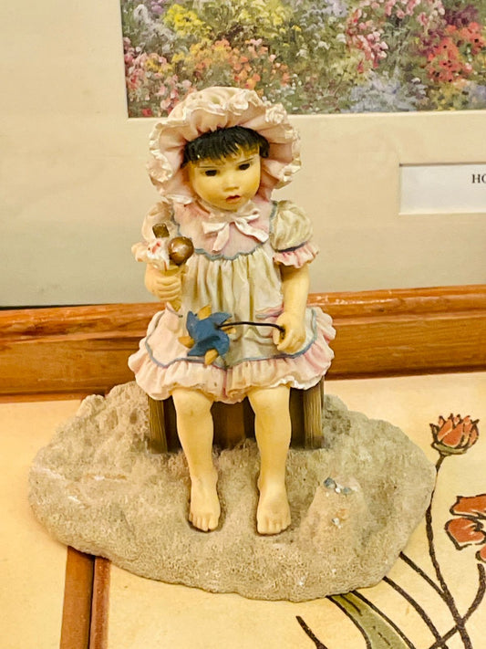 girl figurine, nursery decor, cottagecore collectible, vintage child figurine, toy bird statue, pastel home decor, resin decorative figurine, sweet girl ornament, country style decor, adorable shelf decor