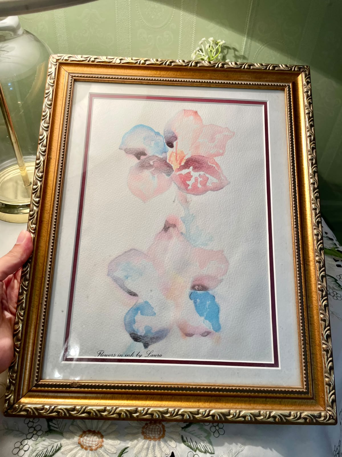 Vintage watercolor painting artwork of soft pink and blue orchid flowers, signed "Flowers in ink by Laura" Frame 14 in