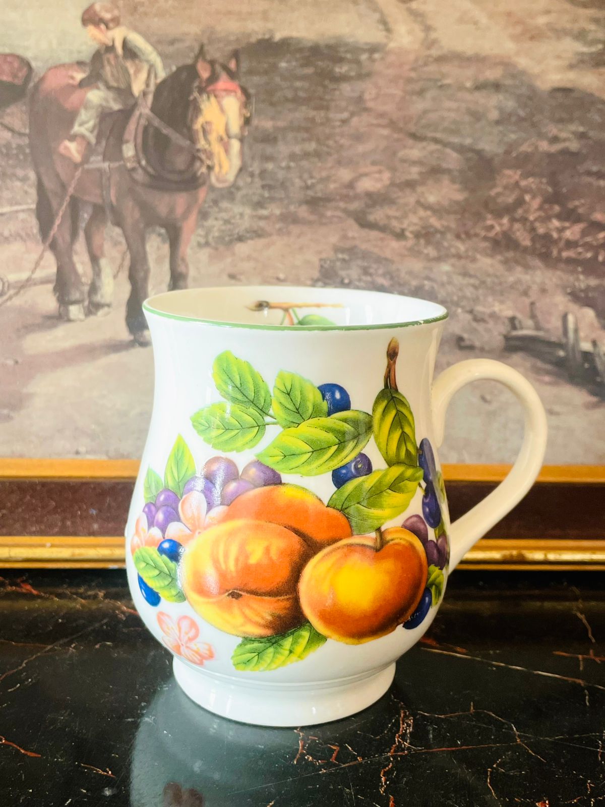 pound world fine bone china mug, orchard fruit design mug, vintage fruit mug, english kitchen crockery, fine bone china mug pakistan, floral fruit mug england, collectible english mug, cottage kitchen mug, vintage bone china cup, colorful english mug, fruity tea mug, english crockery pakistan, vintage thrift mug, english china collectibles