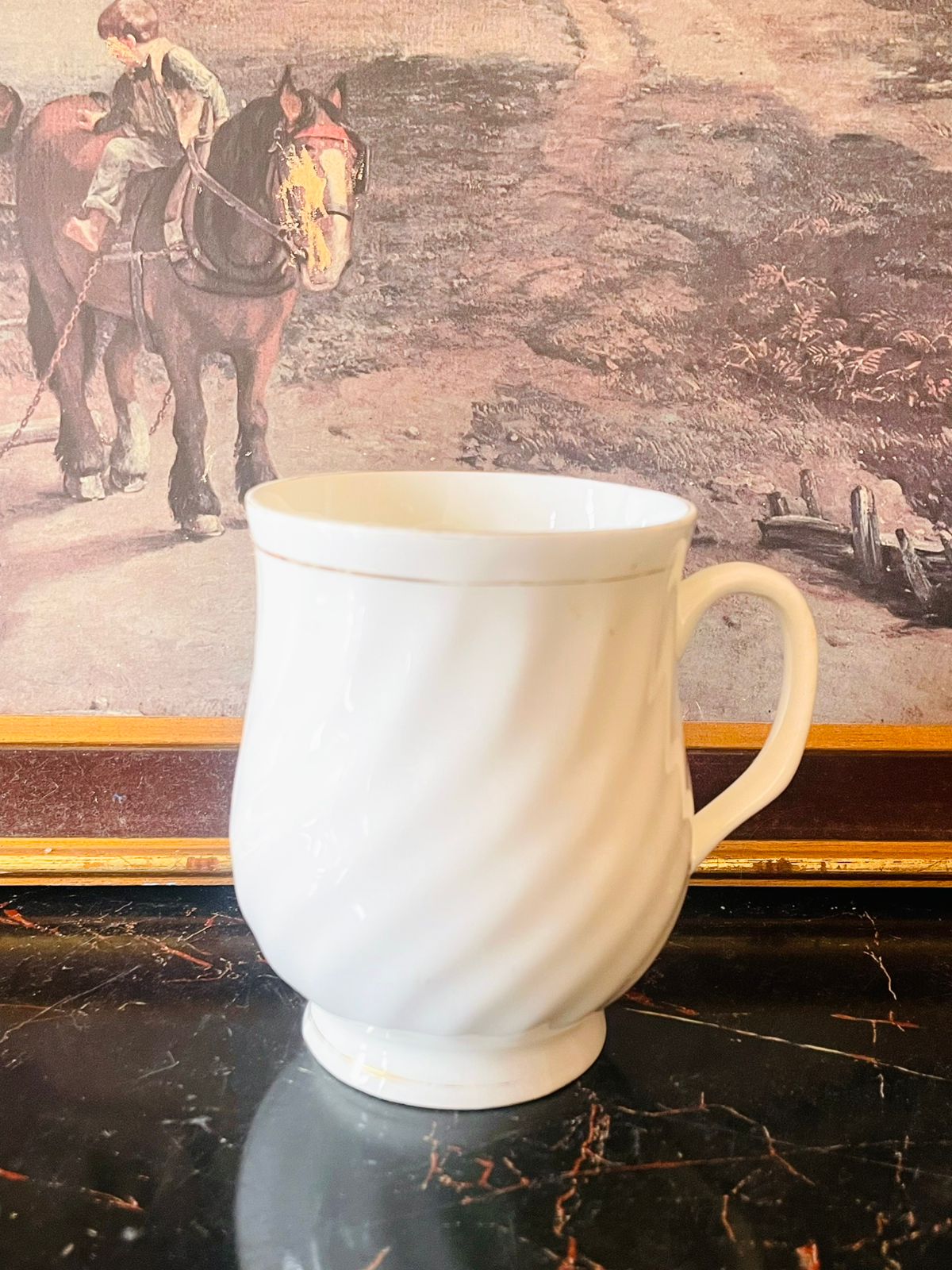 fine bone china mug, white swirl mug, english bone china, minimal ceramic mug, white tea mug england, collectible crockery pakistan, vintage english mug, gold rim china cup, elegant white mug, classic english crockery, bone china tea mug, english kitchen decor, timeless mug design, refined tableware, sunset kitchen collection