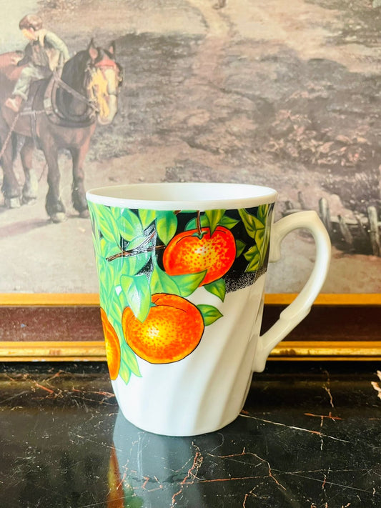psl porcelain mug, orange fruit mug, citrus tea mug, vintage kitchen mug, colorful porcelain mug, fruit design crockery, bright ceramic cup, kitchen decor pakistan, orange grove mug, porcelain tea cup, fine porcelain mug, psl crockery, oven safe mug, coffee mug pakistan, sunset kitchen mugs