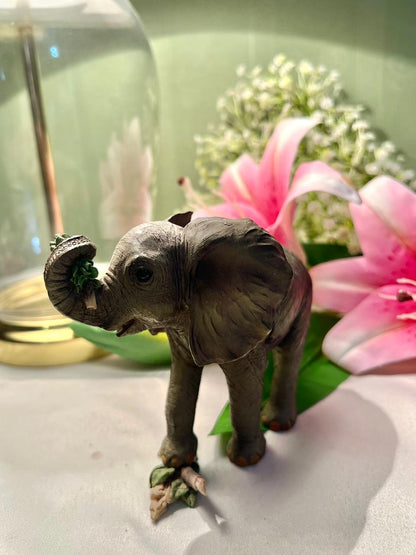 Elephant Figurine with Raised Trunk & Floral Detail – 12 cm