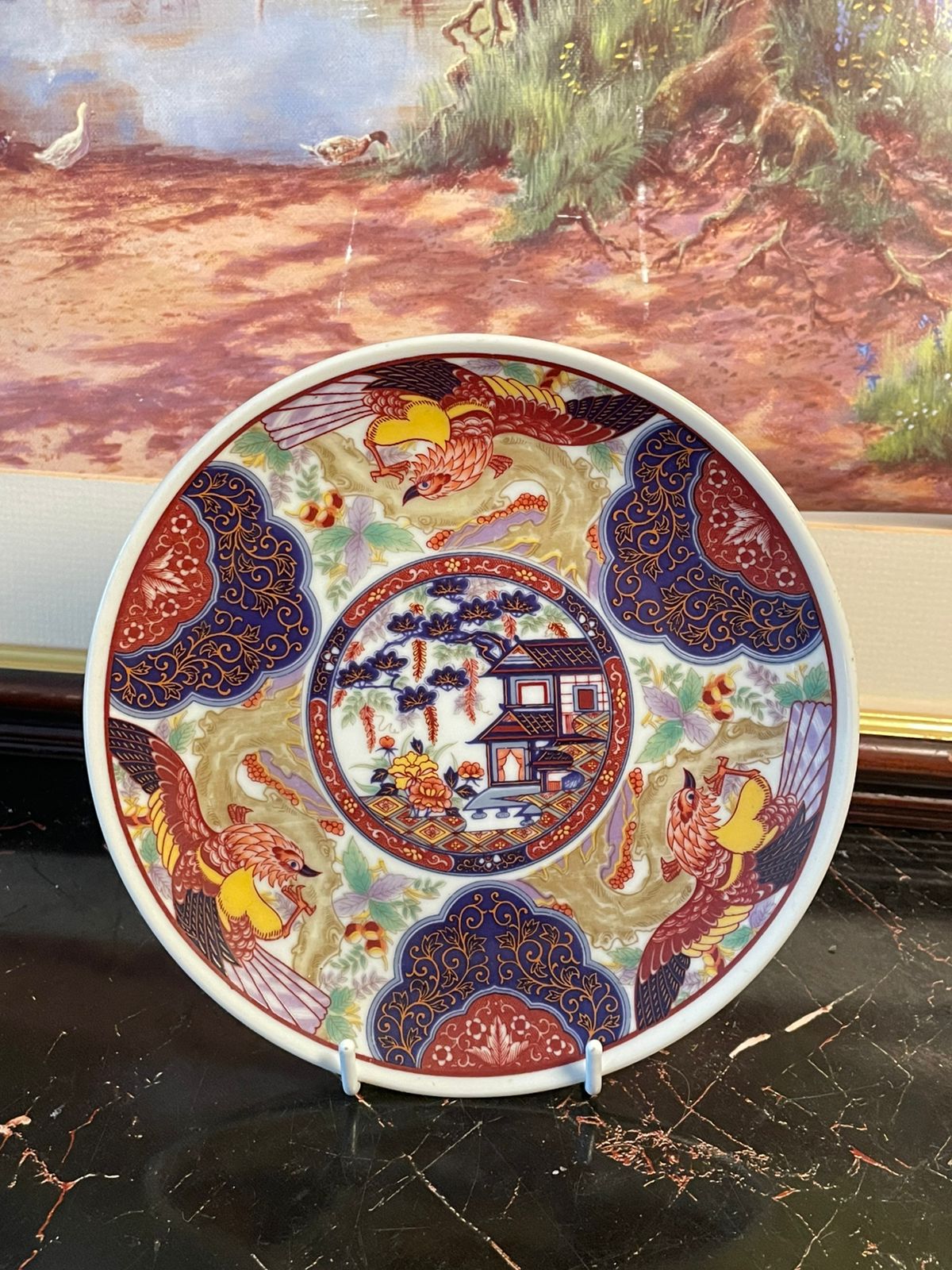 kutani imari plate, japanese decorative plate, oriental art porcelain, vintage imari plate japan, kutani hand painted porcelain, asian decorative wall plate, rare thrift finds pakistan, oriental collectible crockery, heritage asian treasures, japanese phoenix plate, curated vintage collection