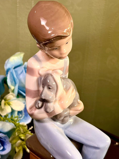 Boy Holding Cat Figurine in Pastel Blue 7 Inch