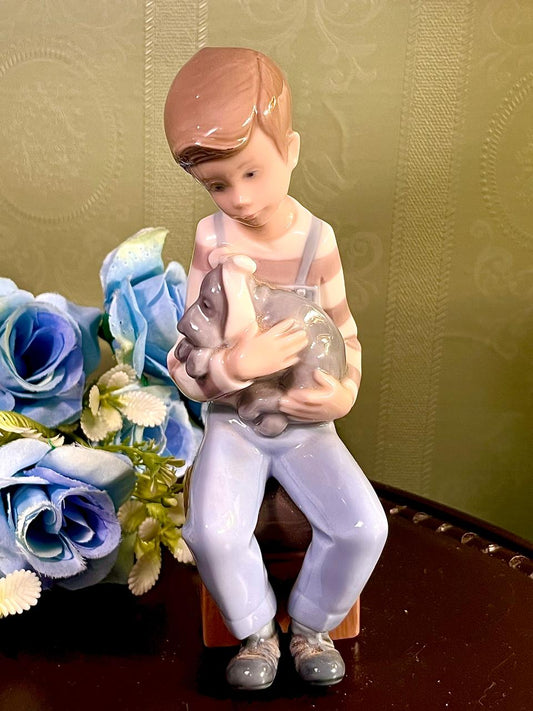 Boy Holding Cat Figurine in Pastel Blue 7 Inch