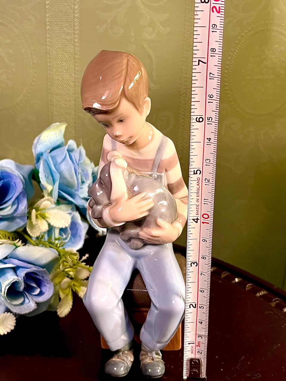 Boy Holding Cat Figurine in Pastel Blue 7 Inch