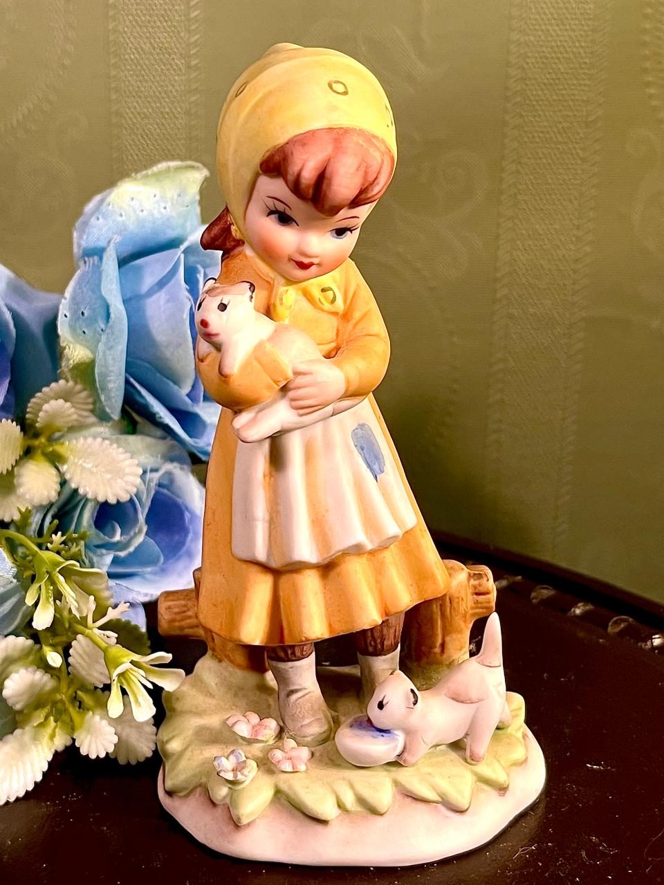 Girl Holding White Puppy Figurine Yellow Hood 4.5 Inch
