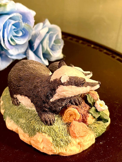 Badger Family Figurine on Floral Base, Approx. 4 Inches