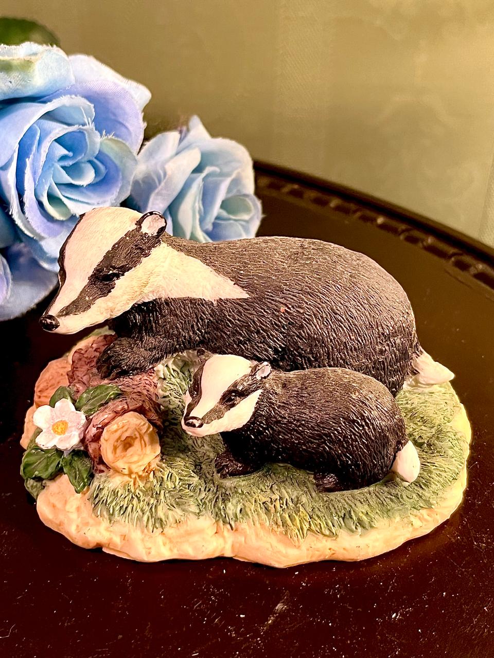 Badger Family Figurine on Floral Base, Approx. 4 Inches